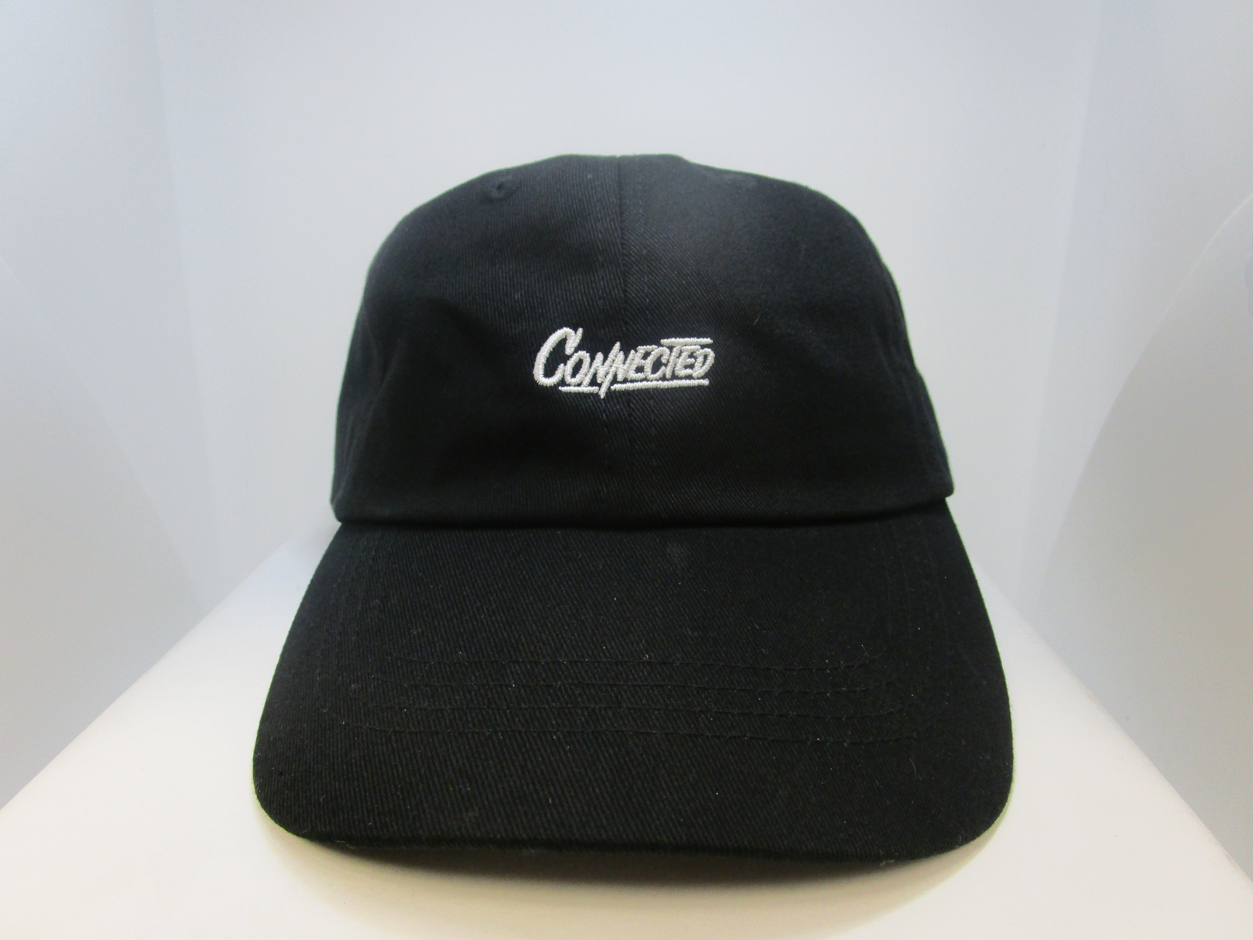 gear-connected-dad-hat-black-small-writing