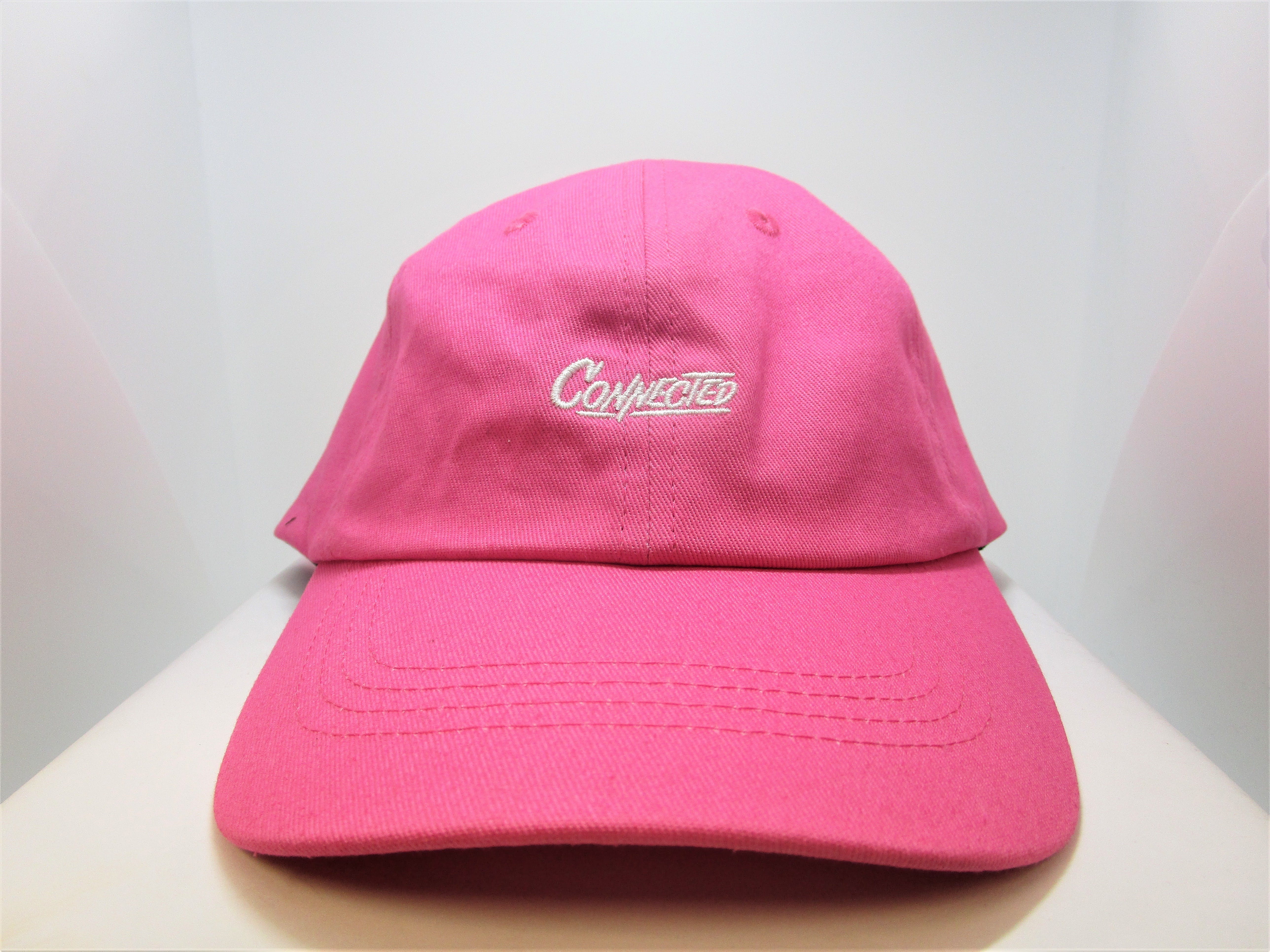 gear-connected-dad-hat-pink-small-writing